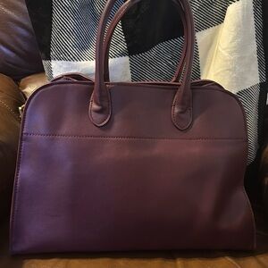 Stylish Burgundy tote bag.